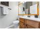 Bathroom with wood vanity and updated fixtures at 4626 S Dillon Ct # B, Aurora, CO 80015