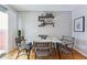 Dining area with marble table and wicker chairs, near kitchen at 4626 S Dillon Ct # B, Aurora, CO 80015