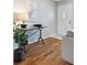 Inviting entryway with hardwood floors, console table and a white door at 4626 S Dillon Ct # B, Aurora, CO 80015