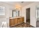 Spacious bathroom with dual sinks, separate tub, and lots of cabinet space at 20000 E Mitchell Pl # 34, Denver, CO 80249