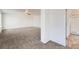 Bright and airy main bedroom featuring plush carpeting and an ensuite bathroom at 20000 E Mitchell Pl # 34, Denver, CO 80249