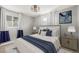 A beautifully decorated bedroom featuring neutral paint and a large comfortable bed at 6005 W 39Th Ave # 6005, Wheat Ridge, CO 80033
