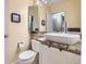 Bright bathroom featuring a vessel sink, granite countertops, and neutral color palette at 8051 Wolff St # I, Westminster, CO 80031