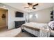 Serene bedroom featuring a dresser, window, and a comfortable bed at 8051 Wolff St # I, Westminster, CO 80031