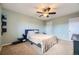 Relaxing bedroom with ceiling fan and carpeted floor at 8051 Wolff St # I, Westminster, CO 80031