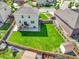 Aerial view of the home with a big backyard and wood fence at 562 Gallo St, Brighton, CO 80603