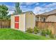 A backyard shed with fresh paint and landscaping at 562 Gallo St, Brighton, CO 80603