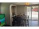 Bright dining room featuring a table with seating and sliding glass doors to the outside at 449 Lowell Blvd, Denver, CO 80204