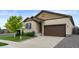 Charming single-Gathering home with a well-maintained lawn, a two-car garage and manicured landscaping at 17960 Weymouth Ave, Parker, CO 80134