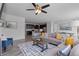 Spacious living room seamlessly connects to the kitchen, offering an open and inviting space at 17960 Weymouth Ave, Parker, CO 80134