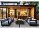 Backyard patio featuring a fire pit and comfortable seating, perfect for outdoor gatherings and relaxation at 346 Elm St, Denver, CO 80220