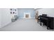 Spacious finished basement with a cozy fireplace and play area, ideal for Gathering fun and entertainment at 346 Elm St, Denver, CO 80220
