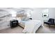 Serene bedroom with calming wallpaper, soft lighting, and a comfortable bed for a restful night's sleep at 346 Elm St, Denver, CO 80220