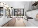 Spacious, open kitchen with an island, high-end appliances, and modern design elements at 346 Elm St, Denver, CO 80220