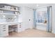 Bright and creative office with a built-in desk, bookshelves, and a charming window seat at 346 Elm St, Denver, CO 80220