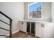 Stylish bar area with custom cabinets and a wine refrigerator, perfect for entertaining at 8500 W 62Nd Ave # D, Arvada, CO 80004