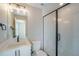 Modern bathroom with glass shower and vanity at 8500 W 62Nd Ave # D, Arvada, CO 80004