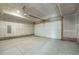 Spacious two-car garage with ample storage space and a clean, unfinished interior at 8500 W 62Nd Ave # D, Arvada, CO 80004
