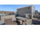 Roof deck featuring outdoor furniture and a grill, ideal for enjoying the fresh air at 8500 W 62Nd Ave # D, Arvada, CO 80004