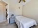 Cozy bedroom with neutral walls and carpeted flooring with a ceiling fan at 24704 E Chenango Dr, Aurora, CO 80016