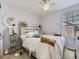 Charming bedroom decorated with natural light, featuring a mirror and eclectic décor at 24704 E Chenango Dr, Aurora, CO 80016