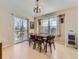 Cozy dining area with natural light and a sliding door that opens to the outdoors at 24704 E Chenango Dr, Aurora, CO 80016