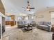 Open living room with a view of the kitchen, perfect for entertaining and Gathering gatherings at 24704 E Chenango Dr, Aurora, CO 80016
