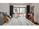 Bright bedroom with hardwood floors and floor-to-ceiling windows at 1050 N Corona St # 312, Denver, CO 80218