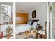 Bright bedroom with natural light, light colored walls and wood accents at 1050 N Corona St # 312, Denver, CO 80218