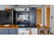 Kitchen features updated countertops and modern black appliances at 1050 N Corona St # 312, Denver, CO 80218