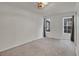 Spacious bedroom with neutral carpeting and large windows at 11127 Alcott St # A, Denver, CO 80234