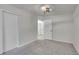 Bright bedroom with carpet flooring and ample closet space at 11127 Alcott St # A, Denver, CO 80234