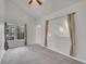 Spacious bedroom with vaulted ceilings and large windows at 11127 Alcott St # A, Denver, CO 80234