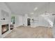 Open kitchen with white cabinets and modern appliances at 11127 Alcott St # A, Denver, CO 80234