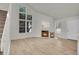 Spacious living area with vaulted ceilings and fireplace at 11127 Alcott St # A, Denver, CO 80234