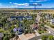 A bird's eye view showcases a well-maintained home within a charming neighborhood near Matney Park, highlighting its prime location at 6258 Lancaster Ave, Castle Rock, CO 80104