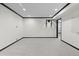 Basement featuring neutral carpeting and a pull up bar, offering ample space for recreation at 5604 Singletree Ln, Parker, CO 80134