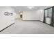 Spacious basement featuring neutral carpeting and a stone fireplace, perfect for entertaining at 5604 Singletree Ln, Parker, CO 80134
