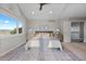 Spacious main bedroom features a vaulted ceiling, large window, and elegant decor at 5604 Singletree Ln, Parker, CO 80134