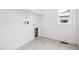 Laundry room with white walls and tile floors, ready for your washer and dryer at 16634 W 93Rd Way, Arvada, CO 80007