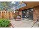 Cozy patio with seating area, barbecue grill, and privacy fence at 7995 E Mississippi Ave # C11, Denver, CO 80247