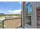 Balcony with black metal railings overlooking the landscape at 457 Interlocken Blvd # 101, Broomfield, CO 80021