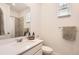 Bright bathroom with white vanity, modern sink, and shower/tub combo at 3461 N Buchanan Way, Aurora, CO 80019