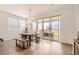 Cozy dining room featuring large sliding glass doors with outdoor views and great natural light at 3461 N Buchanan Way, Aurora, CO 80019