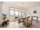 Bright dining area with sliding glass doors leading to an outdoor patio space at 3461 N Buchanan Way, Aurora, CO 80019