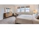 Inviting main bedroom with three large windows and neutral decor at 3461 N Buchanan Way, Aurora, CO 80019