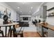 Finished basement area with bar, seating, workspace, and entertainment area at 7257 S Millbrook Ct, Aurora, CO 80016