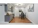 Finished basement wet bar area with seating and modern fixtures at 7257 S Millbrook Ct, Aurora, CO 80016