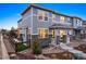 Attractive two-story home featuring manicured landscaping, stone accents, and an inviting front porch at 7257 S Millbrook Ct, Aurora, CO 80016