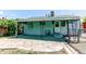 Backyard patio with covered area, offering a private outdoor space for relaxation and entertainment at 745 S Utica St, Denver, CO 80219